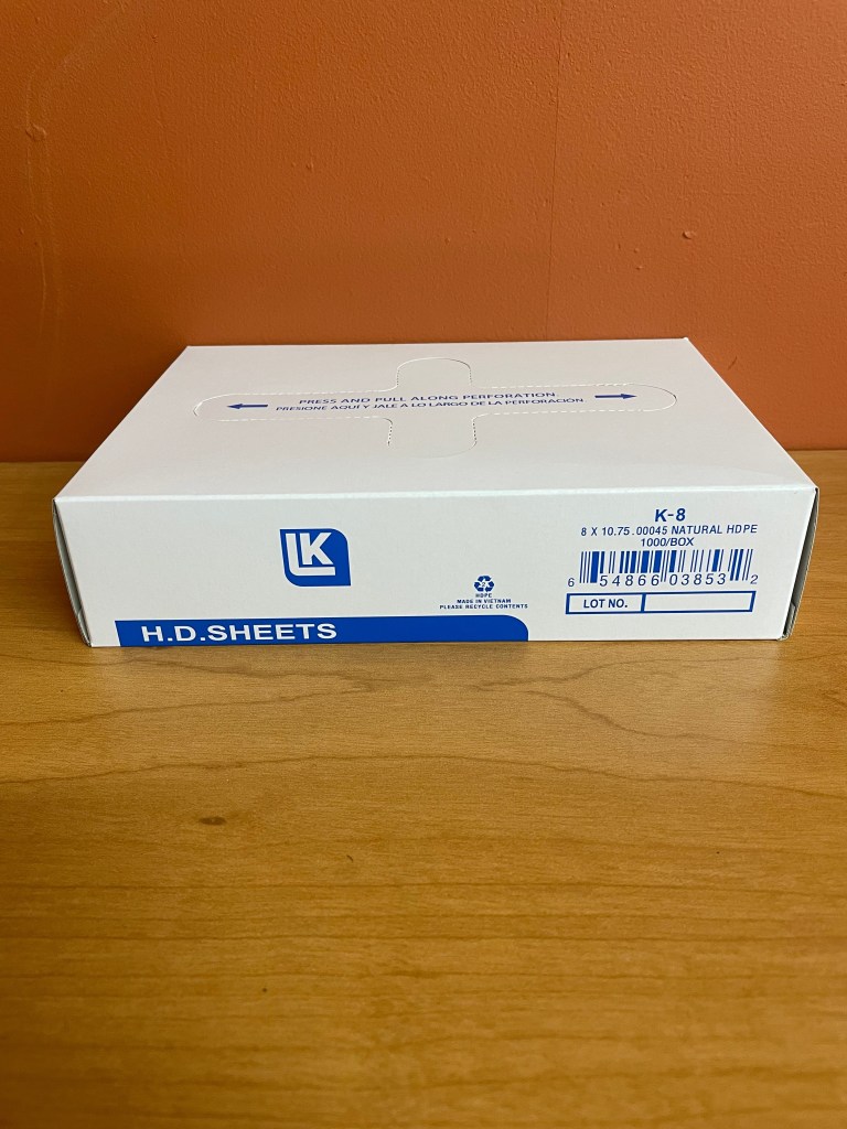 Box of 1000 LK Packaging 10 3/4" x 8" Plastic Deli Wrap and Bakery Wrap Sheets